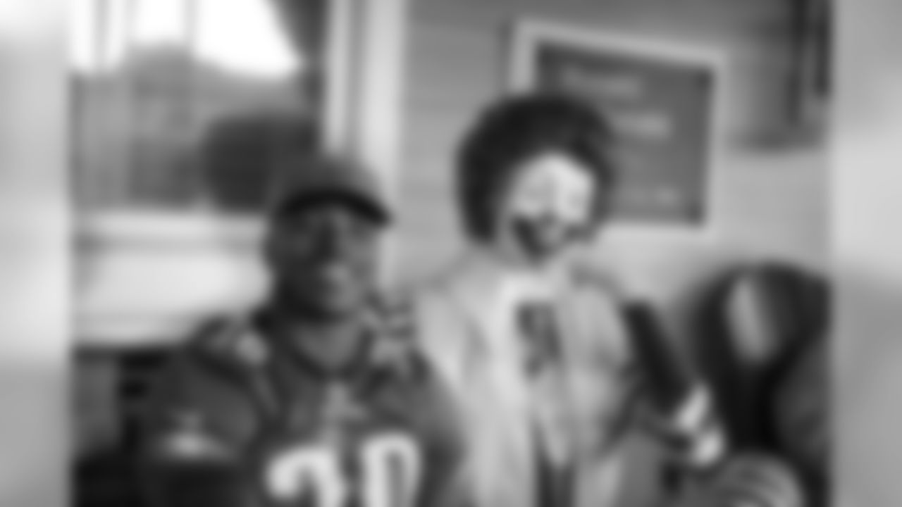 RB Corey Clement hangs out with Ronald McDonald.