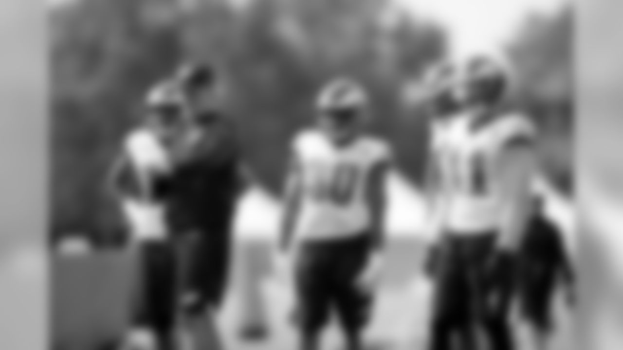 Defensive backs coach Cory Undlin chats with some of the DBs