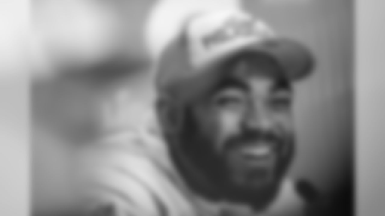 DE Brandon Graham smiles during his time with the media.