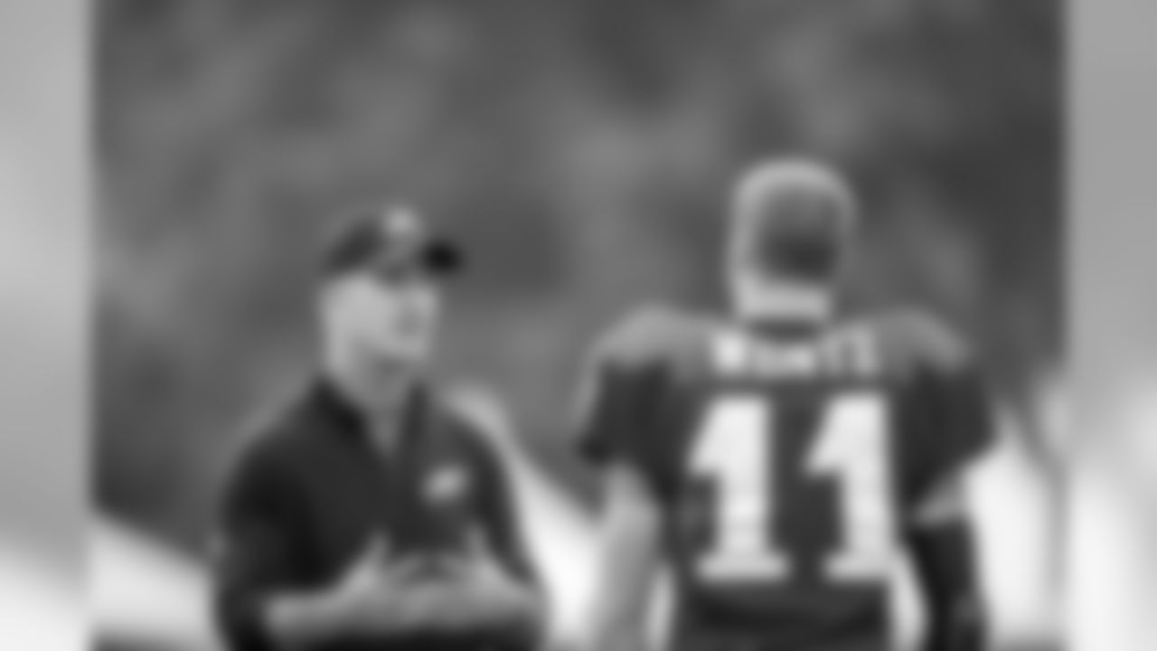 Offensive coordinator Frank Reich and QB Carson Wentz