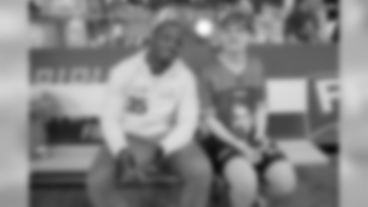 D.J. Killings and one of the players
