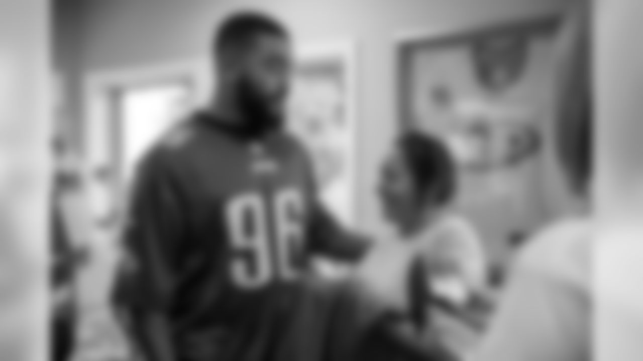DE Derek Barnett meets a parent inside the Orange County Ronald McDonald House.