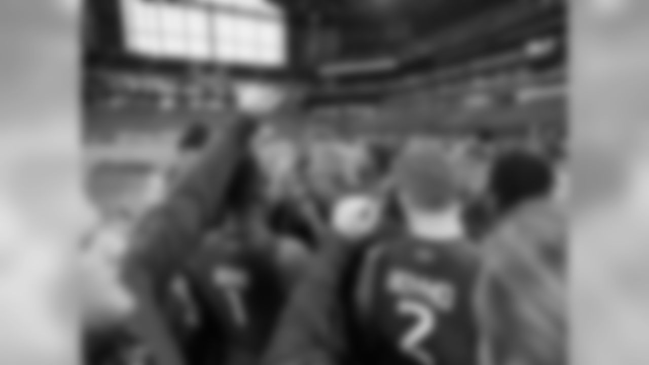Players huddle during the 2015 NFL Scouting Combine at Lucas Oil Stadium on Friday, February 20, 2015 in Indianapolis, IN.