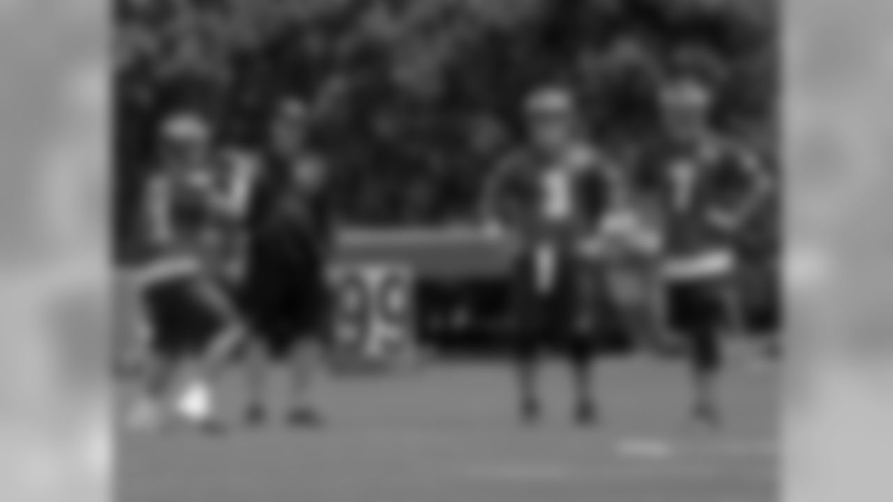 Offensive coordinator Pat Shurmur looks at Tim Tebow, Mark Sanchez and Sam Bradford