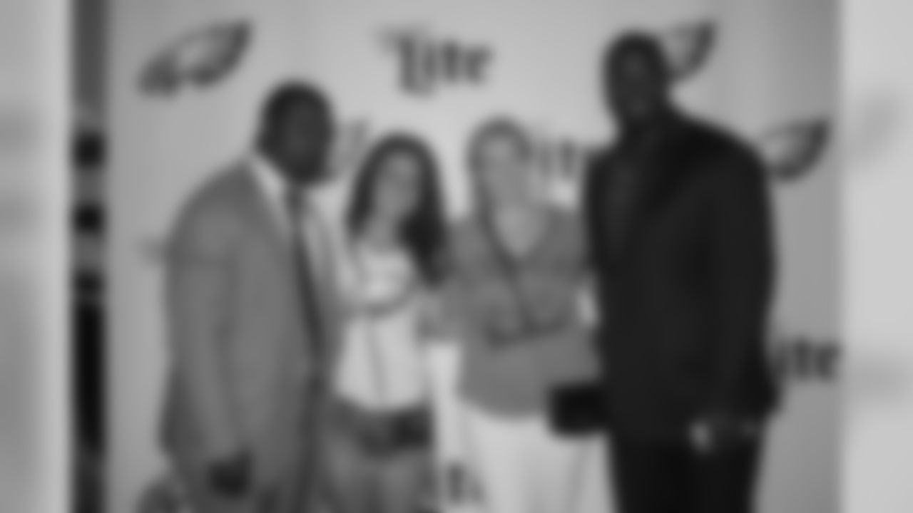 Westbrook and Trotter take another photo with fans