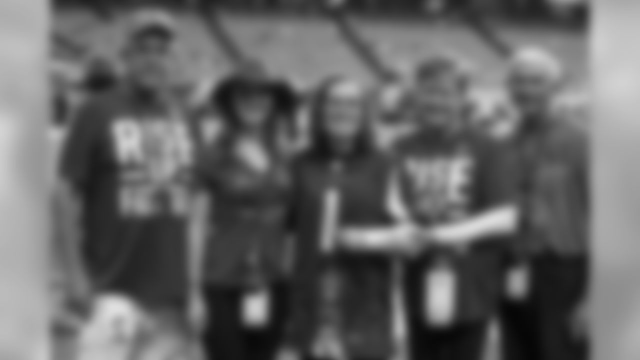 Falcons honorary captain, Emily Bowman, with her family