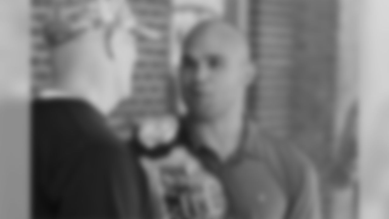 Head coach Dan Quinn and Robbie Lawler