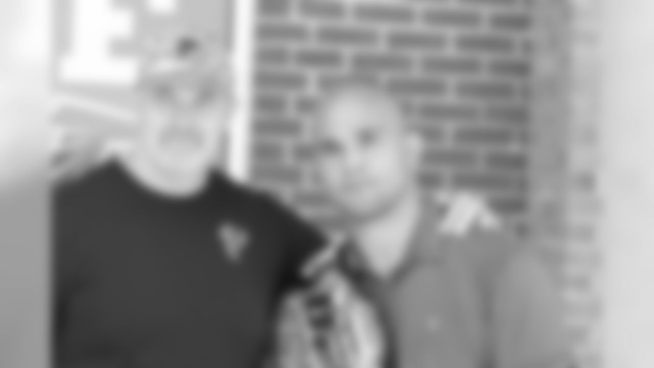 Head coach Dan Quinn and Robbie Lawler
