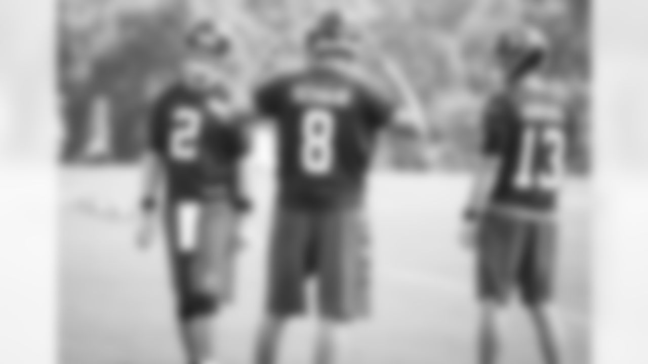 QBs Matt Ryan (2), Matt Schaub (8) and Sean Renfree talk as practice gets underway
