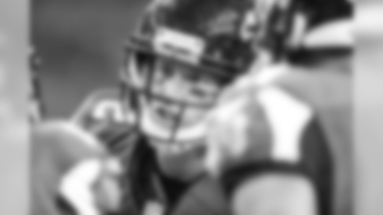 QB Matt Ryan calls a play in the offensive huddle