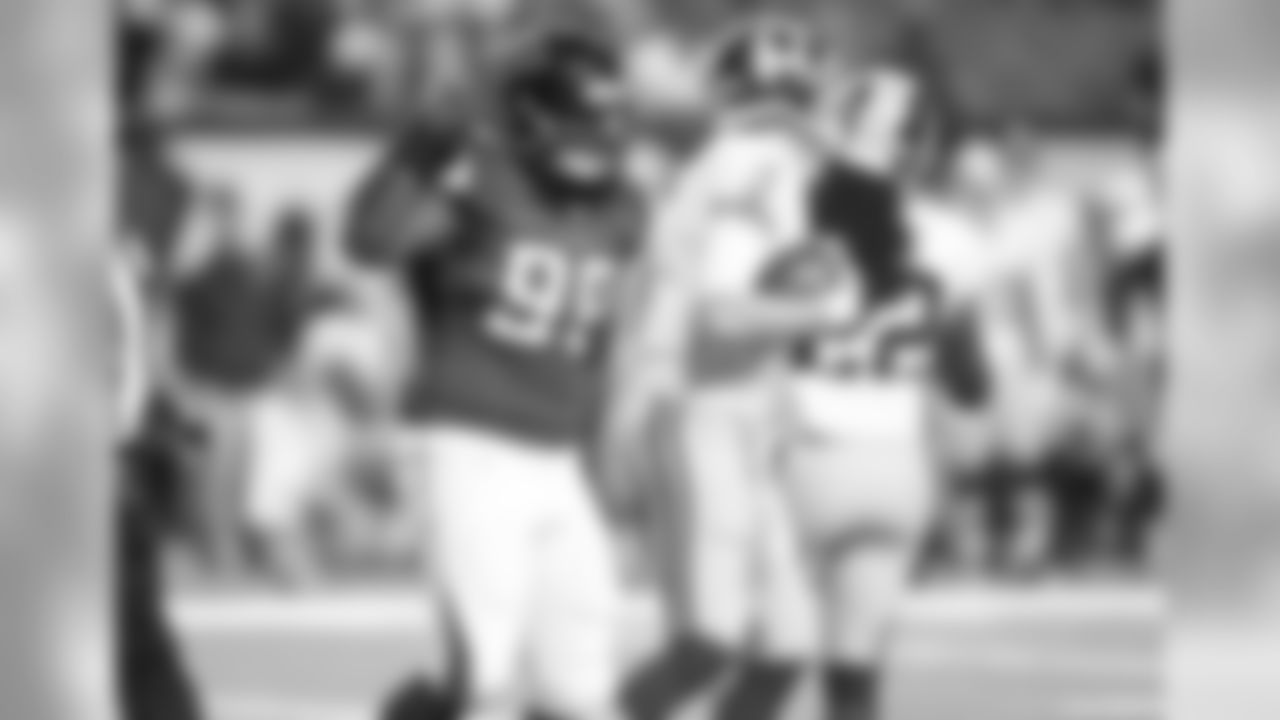 DT Cory Johnson celebrates after getting into the backfield for a sack