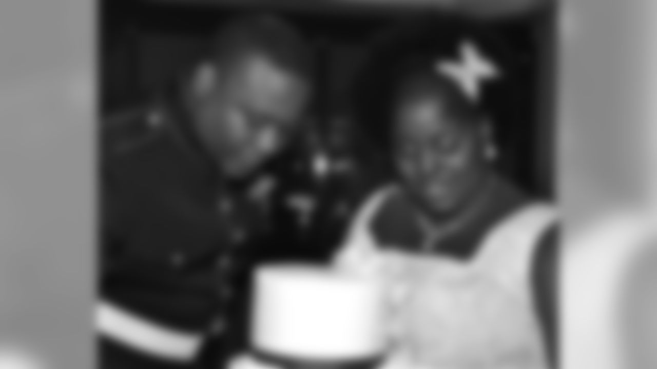 Lance Cpl Omoro Z. Mitchell on his wedding day with wife, Erikka.