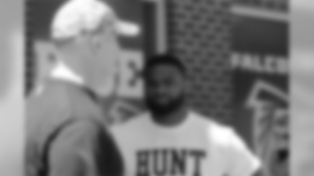 Head coach Dan Quinn and Tyron Woodley