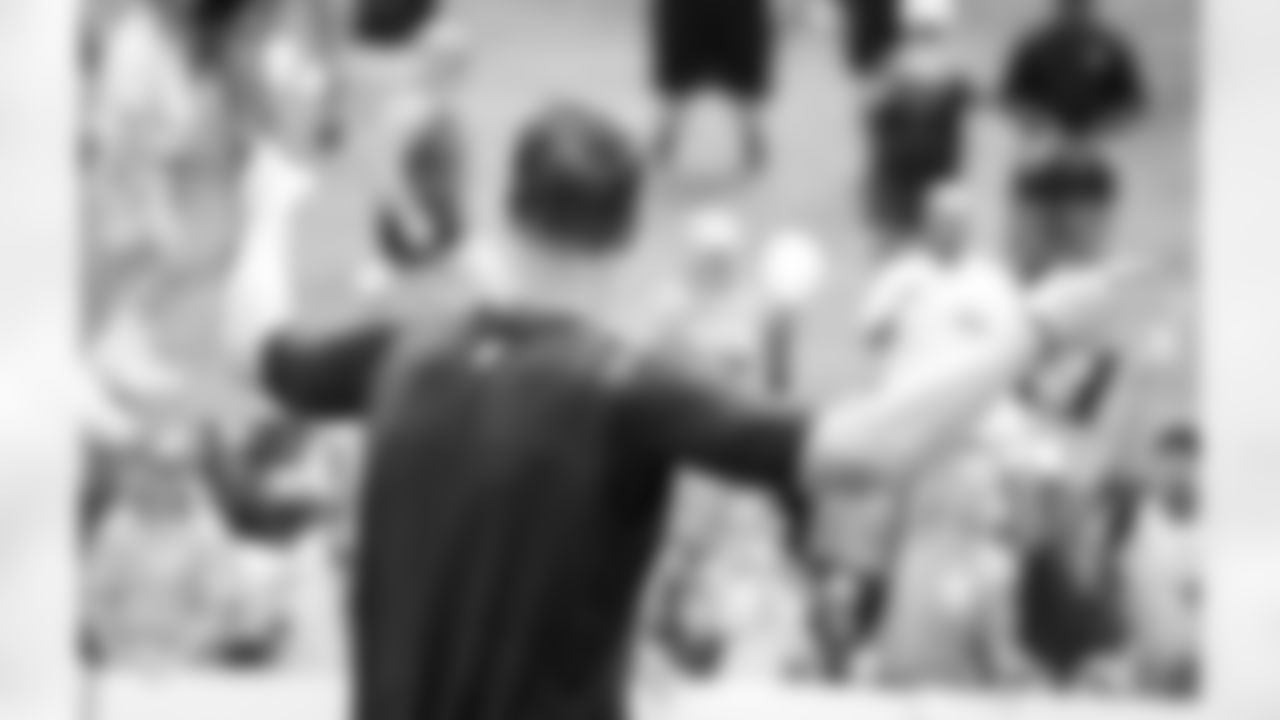 QB Matt Ryan works the crowd before signing autographs after practice