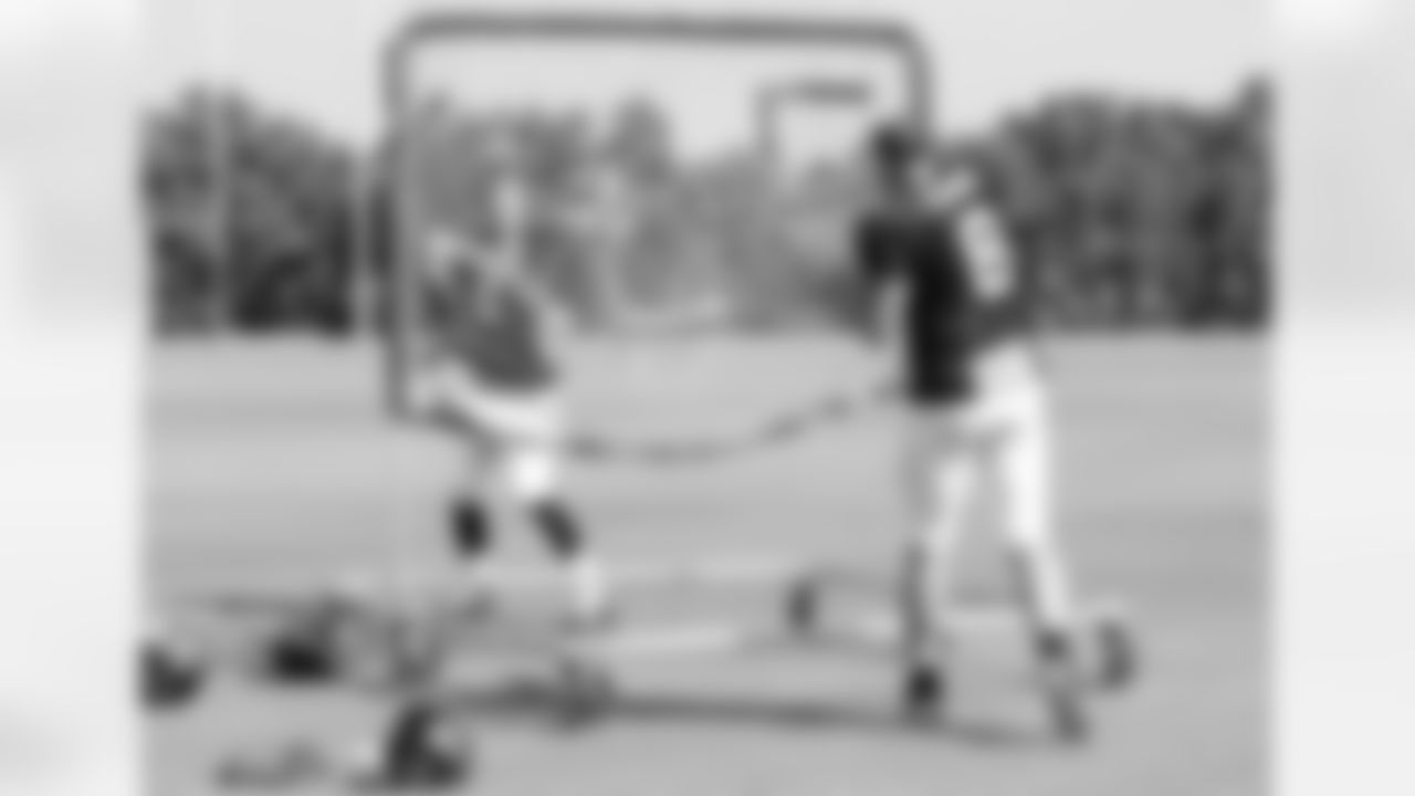 QB Matt Schab warms up with QB Matt Ryan