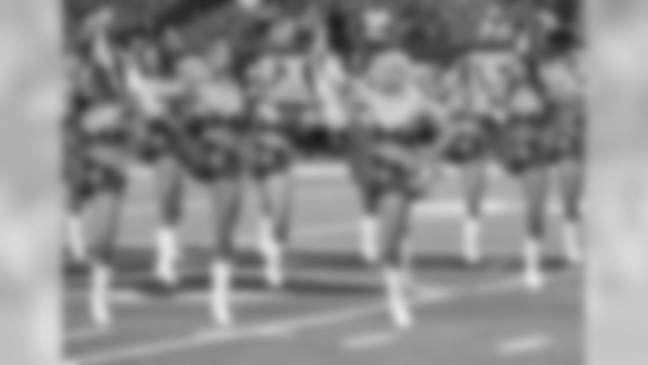 The Atlanta Falcons Cheerleaders perform at midfield as the Falcons get set to face the Redskins