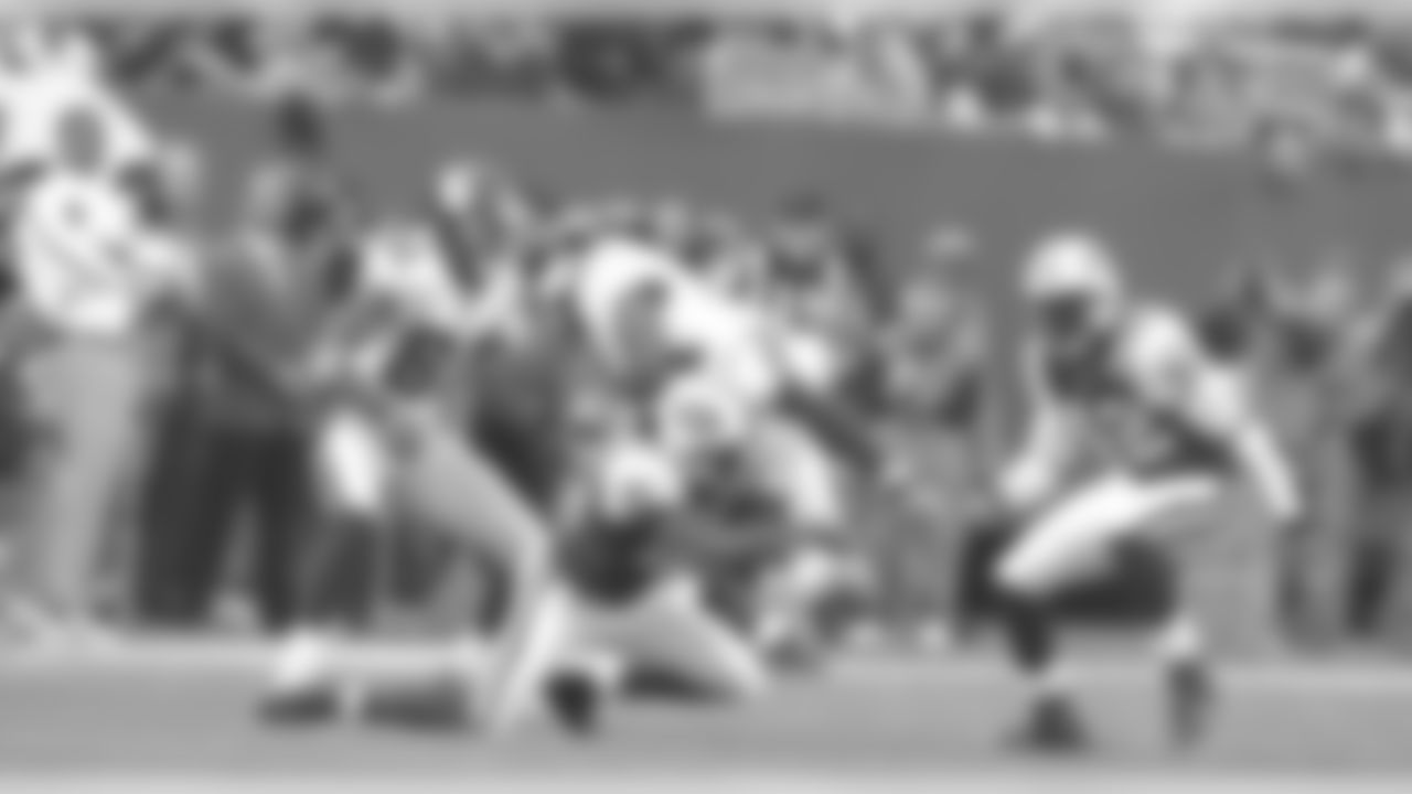 Jets CB Aaron Beasley (21) makes a tackle in the 31-28 OT loss to the Giants.