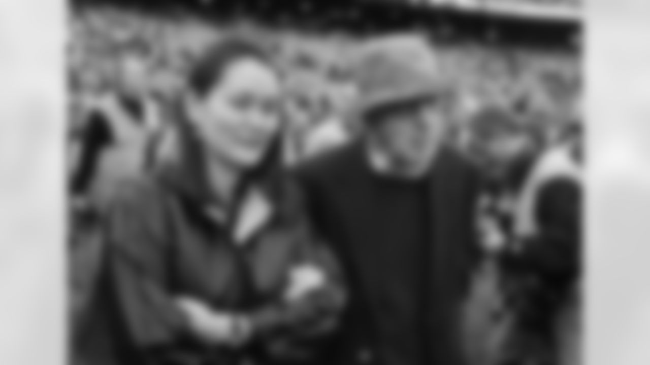 Woody Allen walks onto the field before the Jets vs Dolphins game.