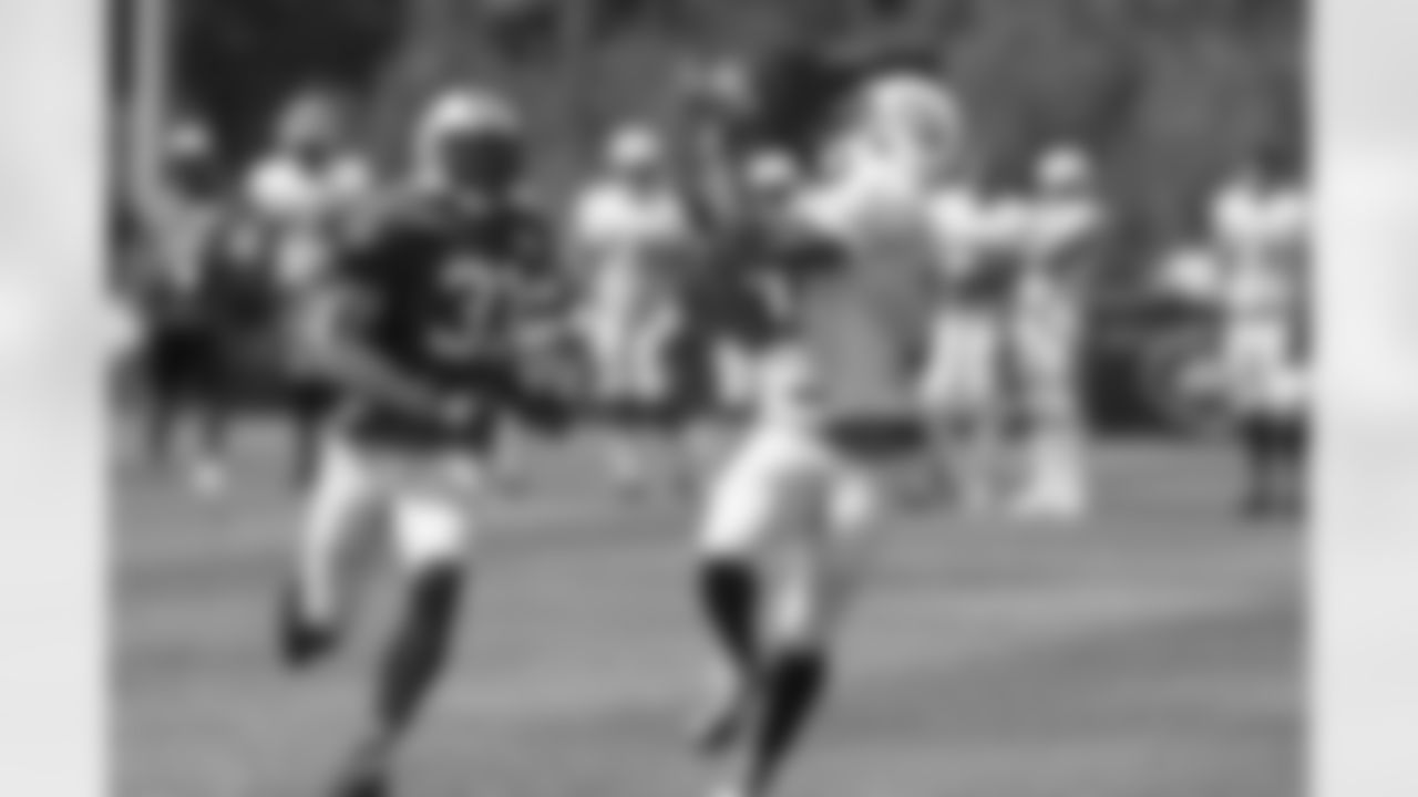 WR Chris Owusu and CB Antonio Cromartie