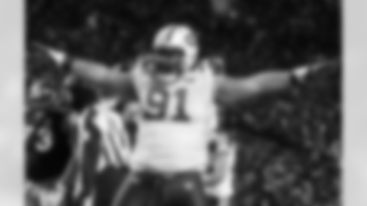 Sione Pouha Photos