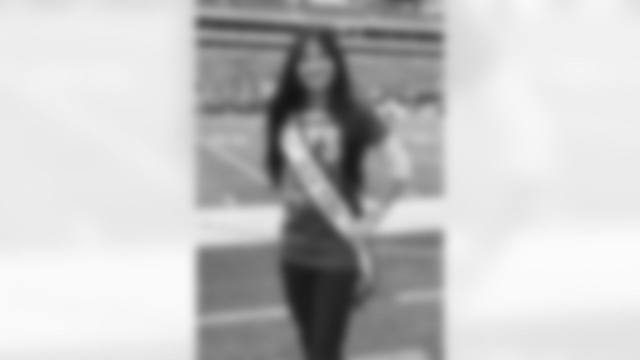 Miss New York, Elizabeth Tam, poses on the sideline before the Jets vs Chargers game at MetLife Stadium.