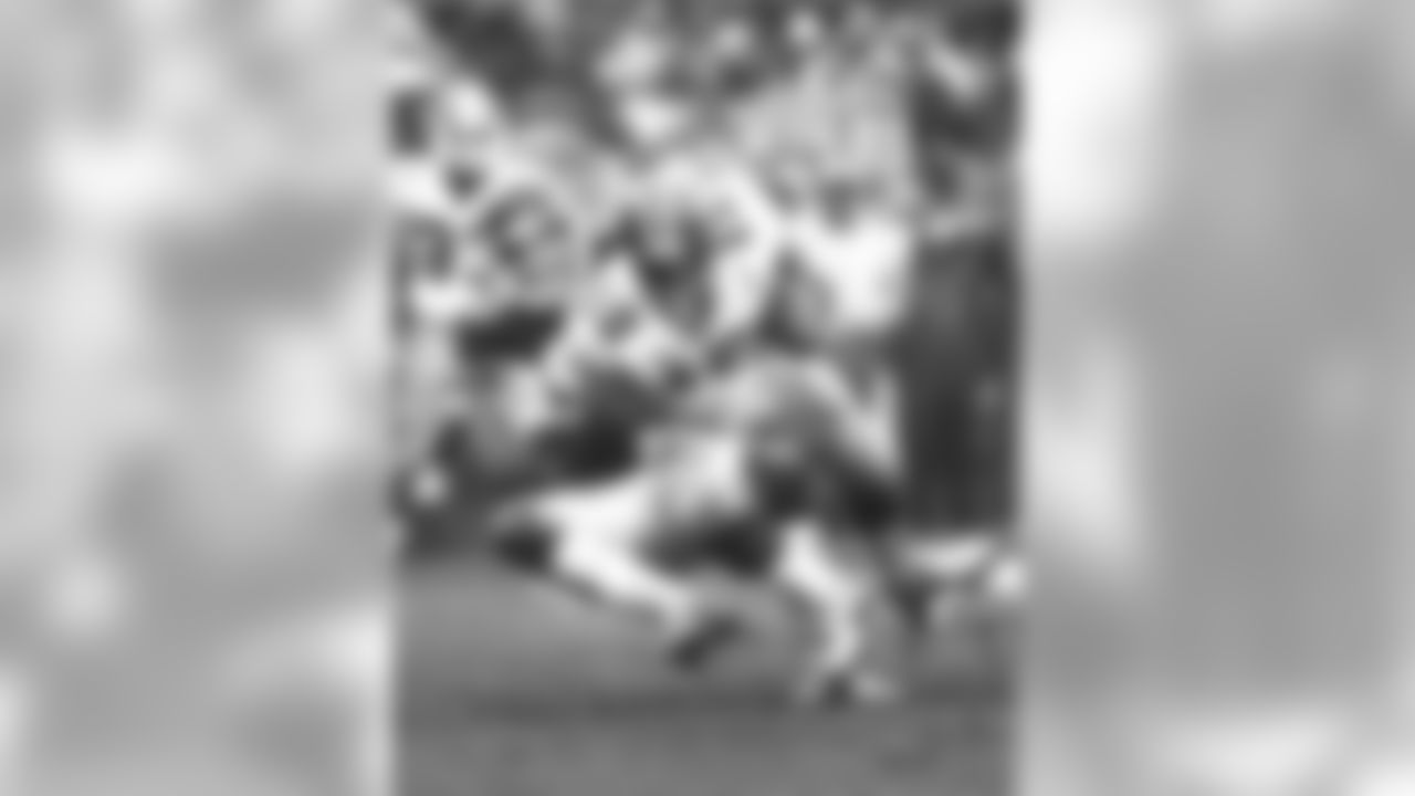 Soon-to-be-inducted Ring of Honor member Marty Lyons does what he does best, dragging QB Steve Bartowski for a sack in the 27-21 loss to the Falcons on 10/23/83.