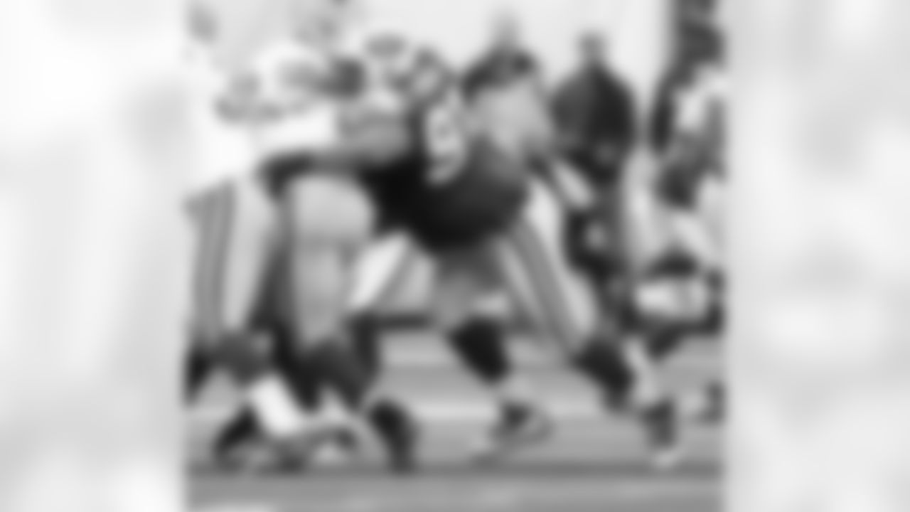 Sione Pouha Photos