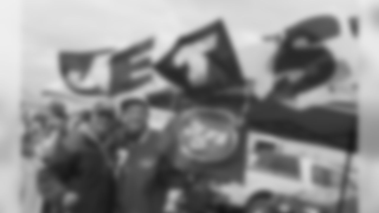 Jets fans collected all four J-E-T-S flags from the home opener and proudly hang them high as they enjoy a Sunday morning gameday tailgate.
