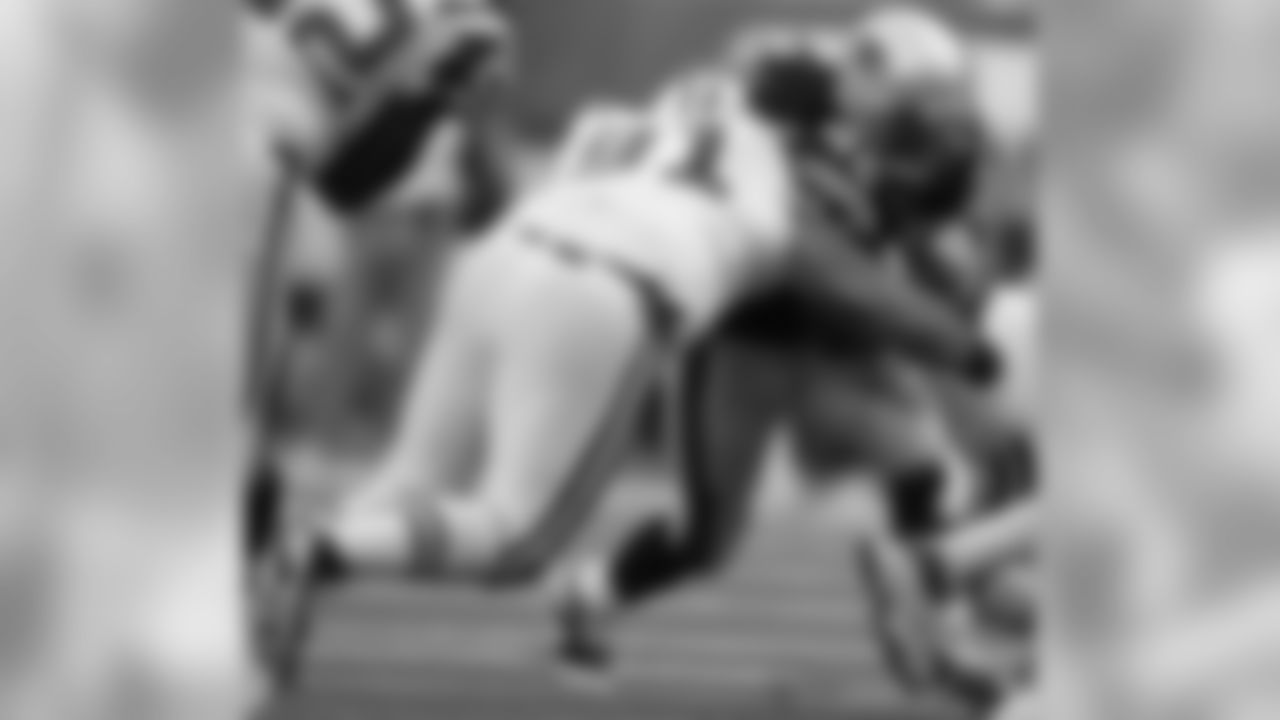 Sione Pouha Photos