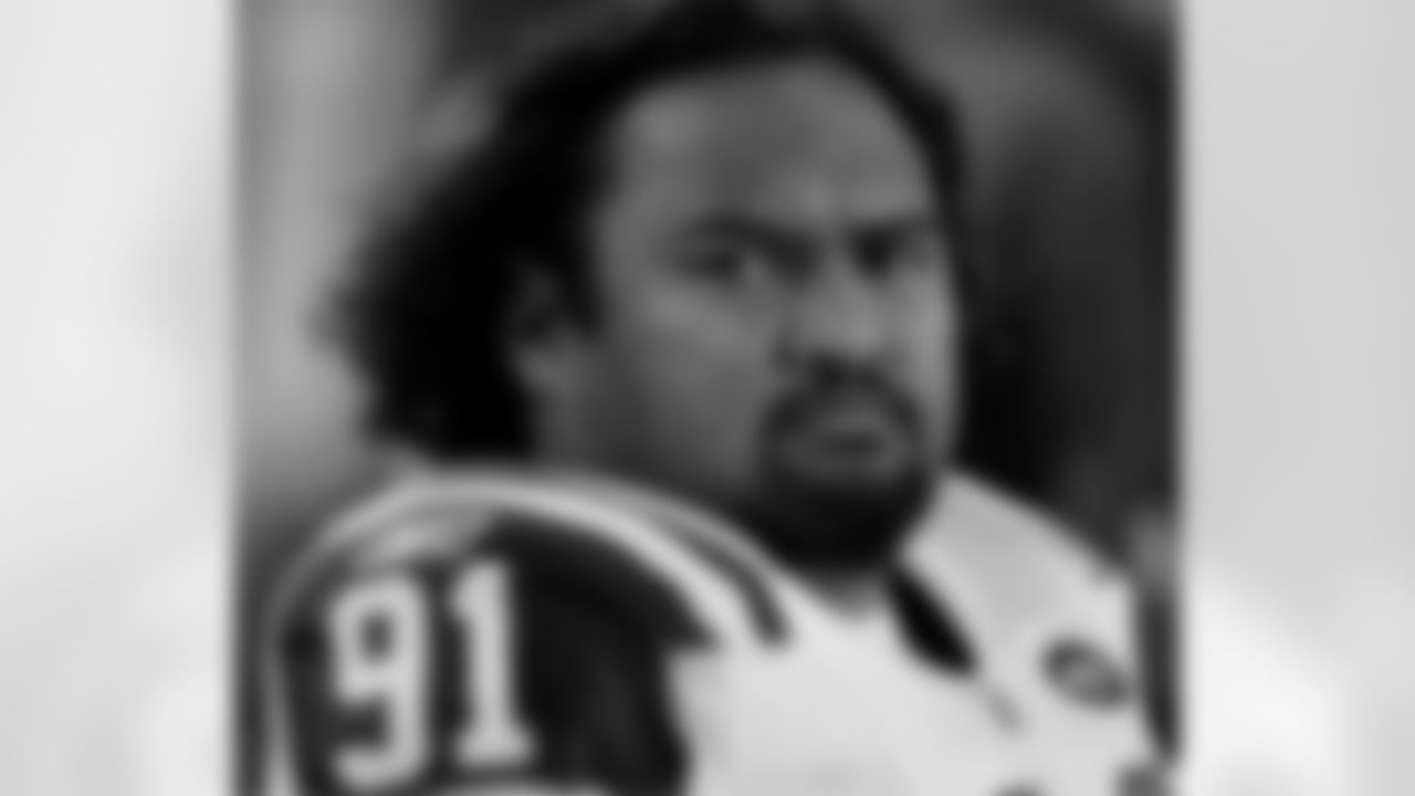 Sione Pouha Photos