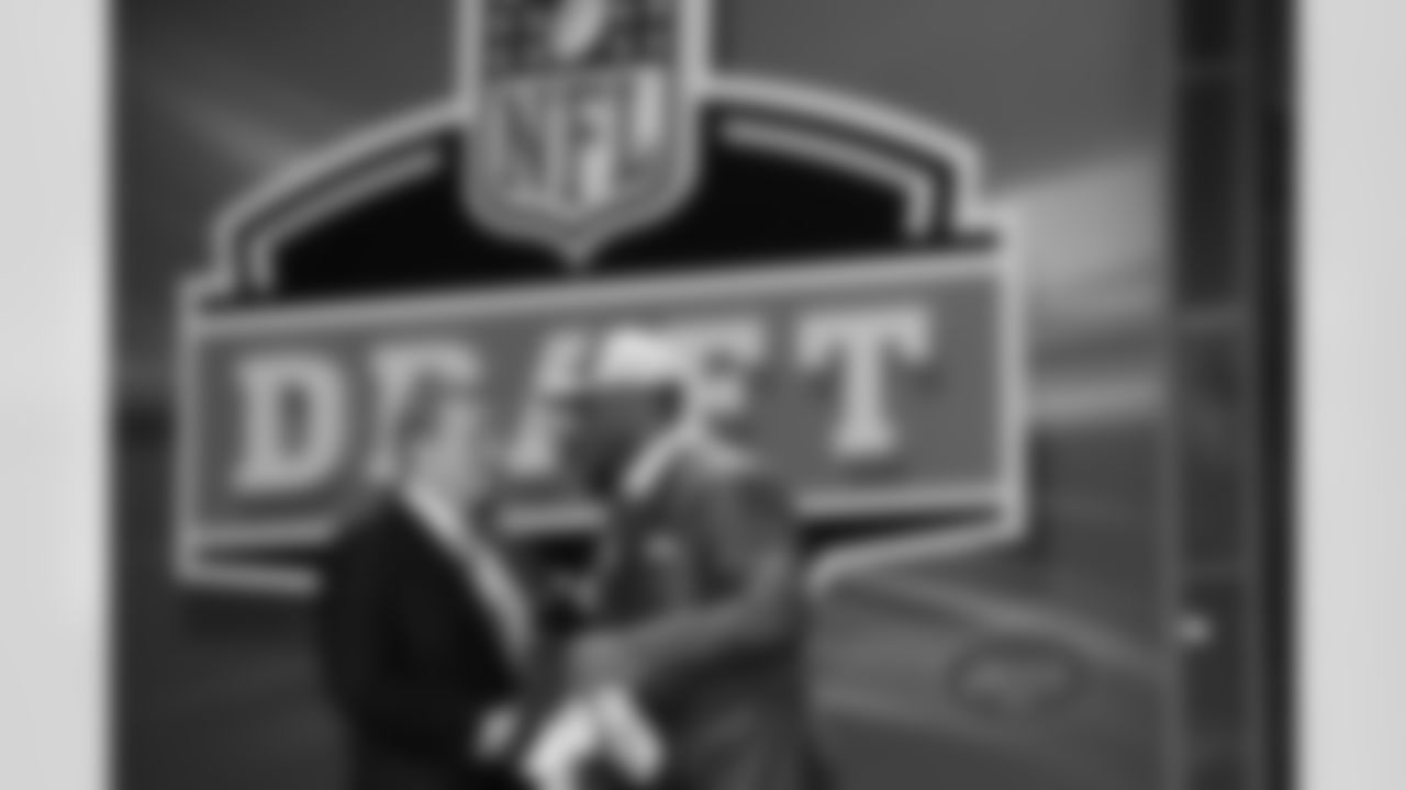 Gholston gets congratulations from Commissioner Goodell