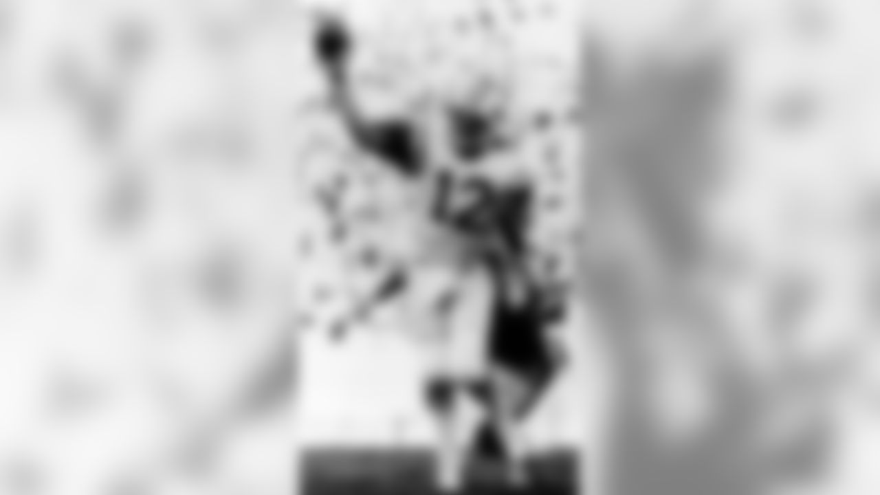 Broadway Joe releases a pass completed to Jets running back Bob Burns in overtime. The Jets came out on top, 26-20.
