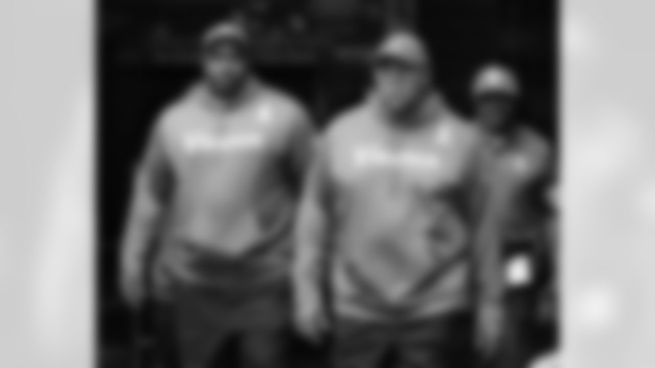 Jimmie Johnson (left) spent eight seasons as Minnesota's tight ends coach and before that was a 10-year blocking TE with four NFL teams.