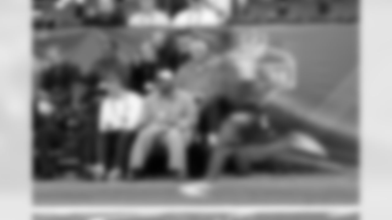 Pictured left in background: Mike Maccagnan
