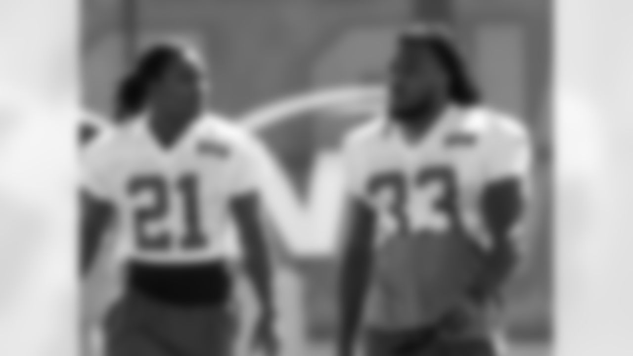 Running backs Chris Johnson, left, and Chris Ivory may have different approaches in playing the position, but similar hair styles have led to the tandem's nickname, "The Two-Dreaded Monster."