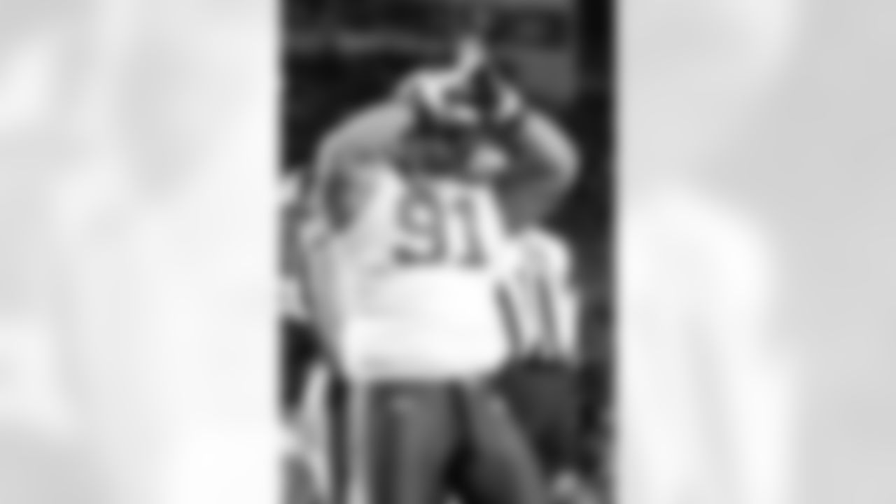 Sione Pouha Photos
