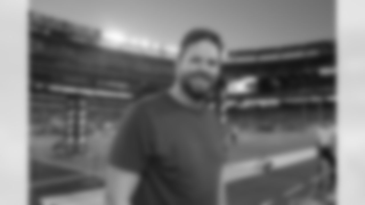 Actor David Denman is on the field for intros during the Jets vs Panthers preseason game.