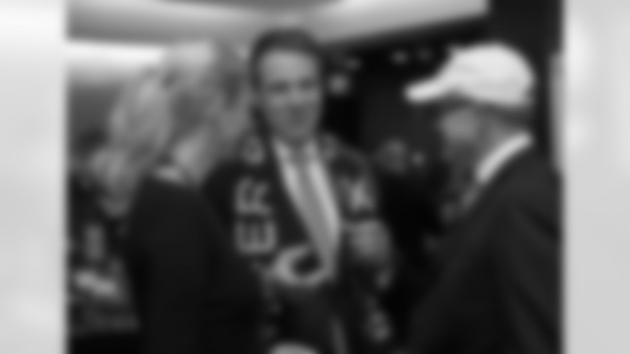 NY Governor Andrew Cuomo chats with Jets Owner Woody Johnson during Super Bowl 48.
