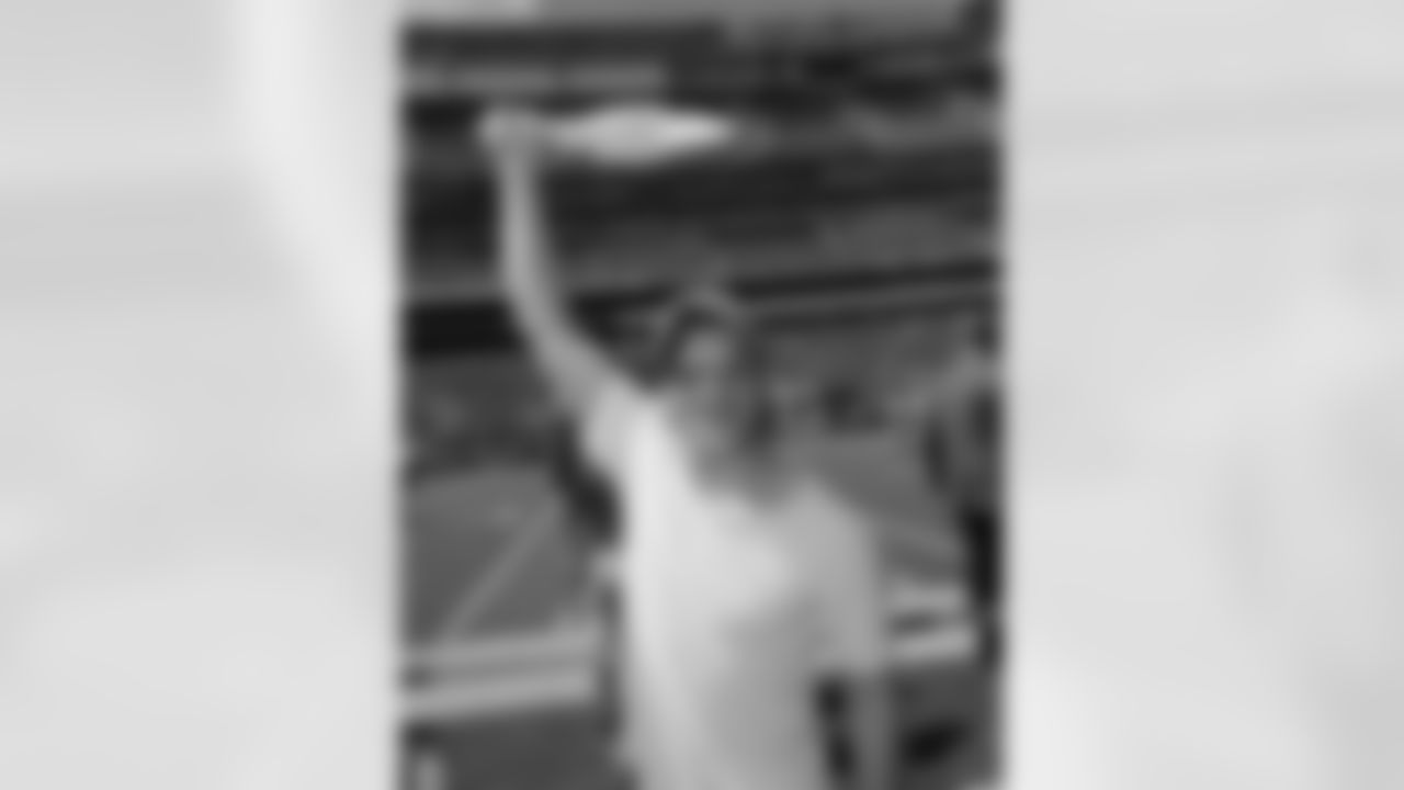 Evan Jonigkeit, known for his role in X-Men: Days of Future Past, waved his Whiteout Towel as the Jets warmed up before their clash with the Oakland Raiders.