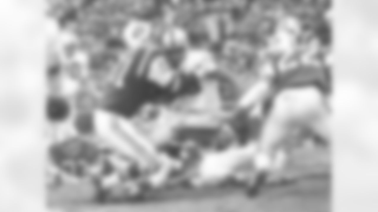 LB Ralph Baker stops the Raiders' ball carrier during the AFL Championship Game, a 27-23 Jets win on 12/29/68 at Shea Stadium.
