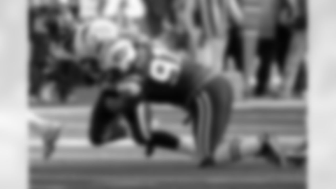Sione Pouha Photos