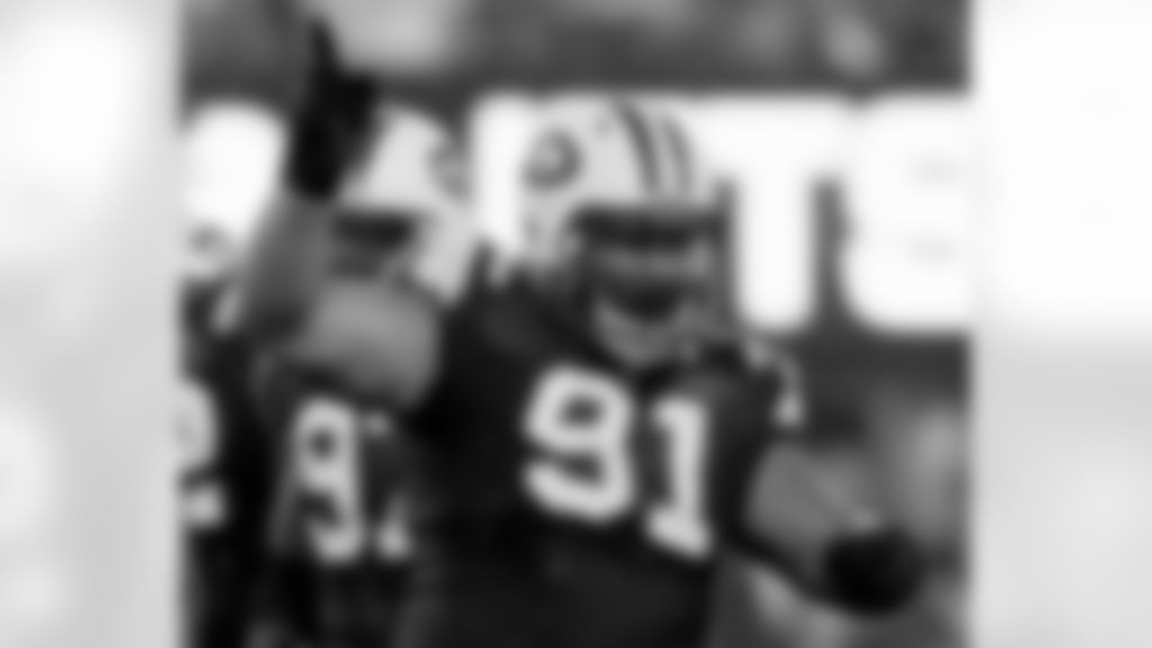 Sione Pouha Photos