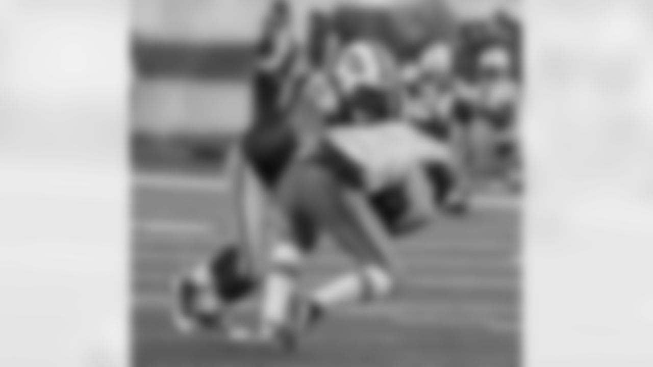 Sione Pouha Photos
