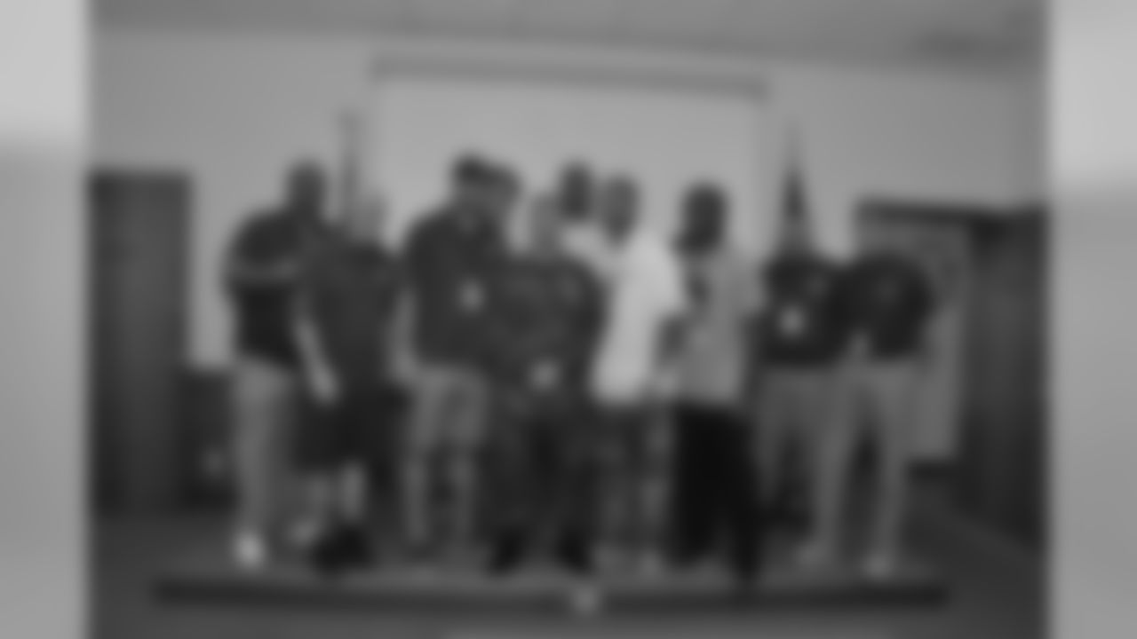 Group photo in Okinawa, Japan. Left to right: William Henderson, Red Batty, Ryan Taylor, Greg Van Roten, Brad Jones, Seneca wallace, Justin Bethel, Tom Bakken and Pepper Burruss.