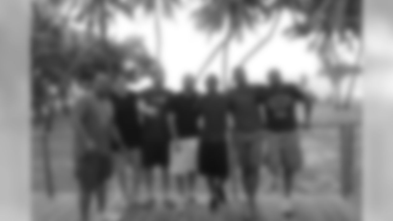 Guam - left to right: William Henderson, Greg Van Roten, Ryan Taylor, Seneca Wallace, Justin Bethel, Brad Jones and Dorsey Levens.