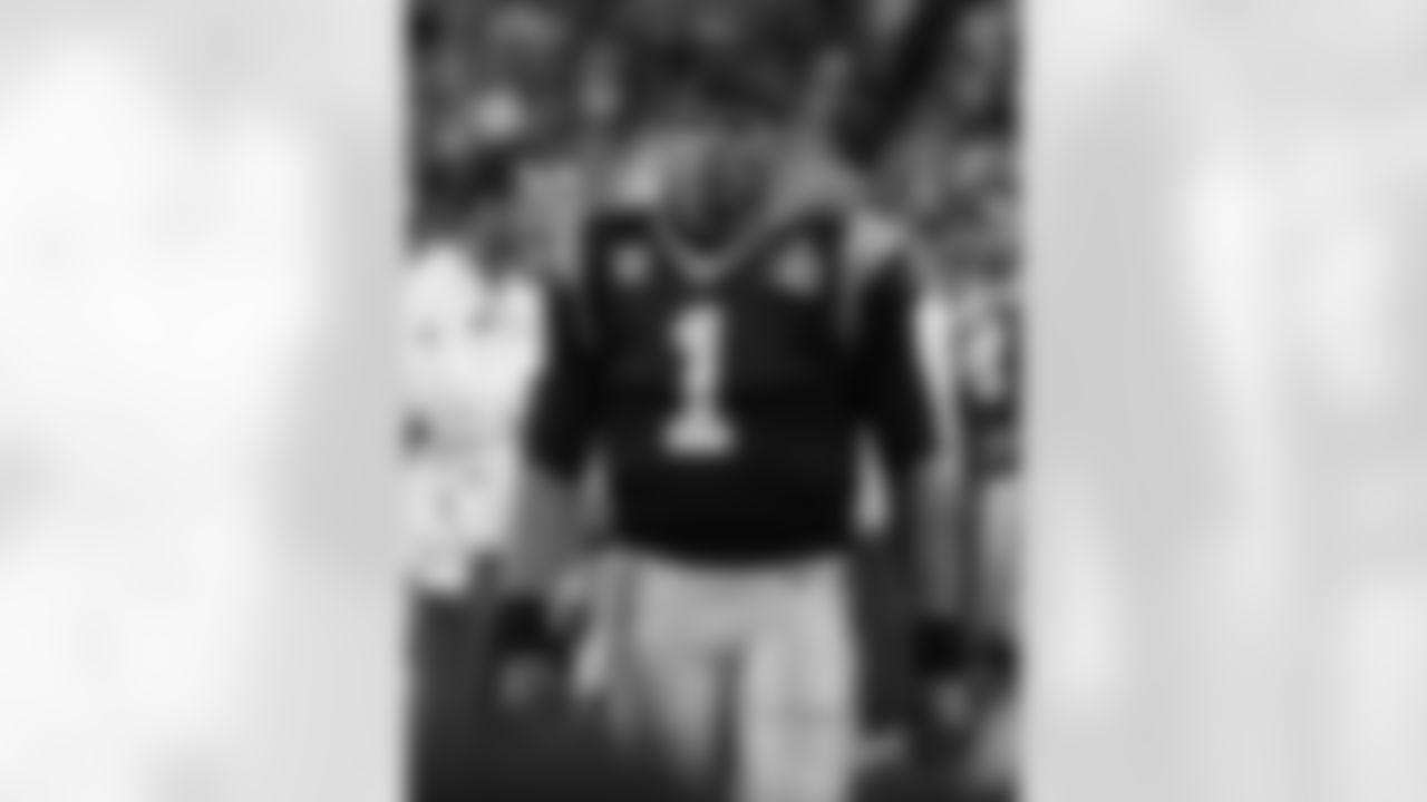 Carolina Panthersâ Cam Newton (1) walks near the bench during the second half of the NFL Super Bowl 50 football game against the Denver Broncos Sunday, Feb. 7, 2016, in Santa Clara, Calif. (AP Photo/Marcio Jose Sanchez)