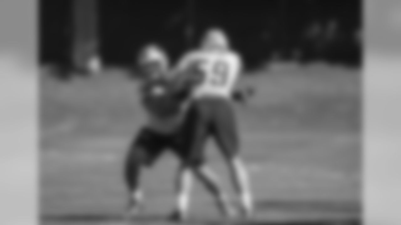 LBs A.J. Klein and Luke Kuechly