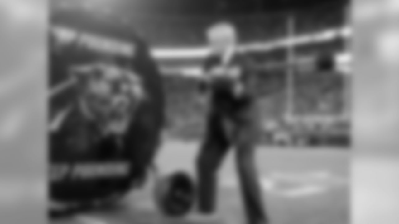 Carolina Panthers owner Jerry Richardson hits a drum before the NFL football NFC Championship game against the Arizona Cardinals, Sunday, Jan. 24, 2016, in Charlotte, N.C. (AP Photo/Mike McCarn)