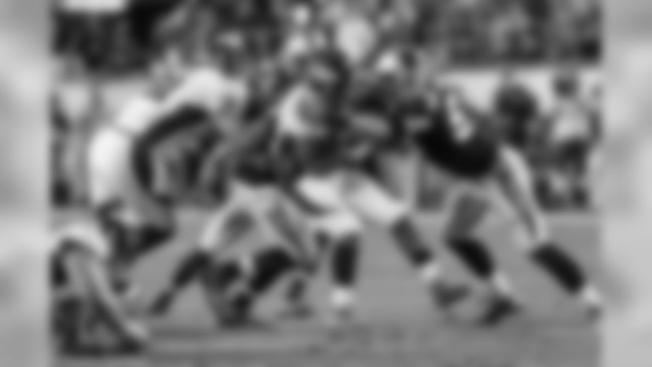 DE Charles Johnson and LB Luke Kuechly