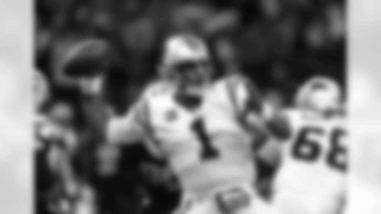 Carolina Panthers quarterback Cam Newton (1) passes in the first half of an NFL football game against the New Orleans Saints in New Orleans, Sunday, Jan. 7, 2018. (AP Photo/Butch Dill)